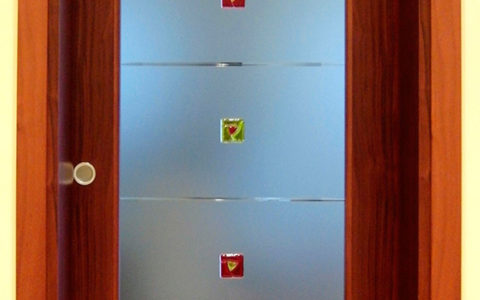 Porta Decorata con Formelle